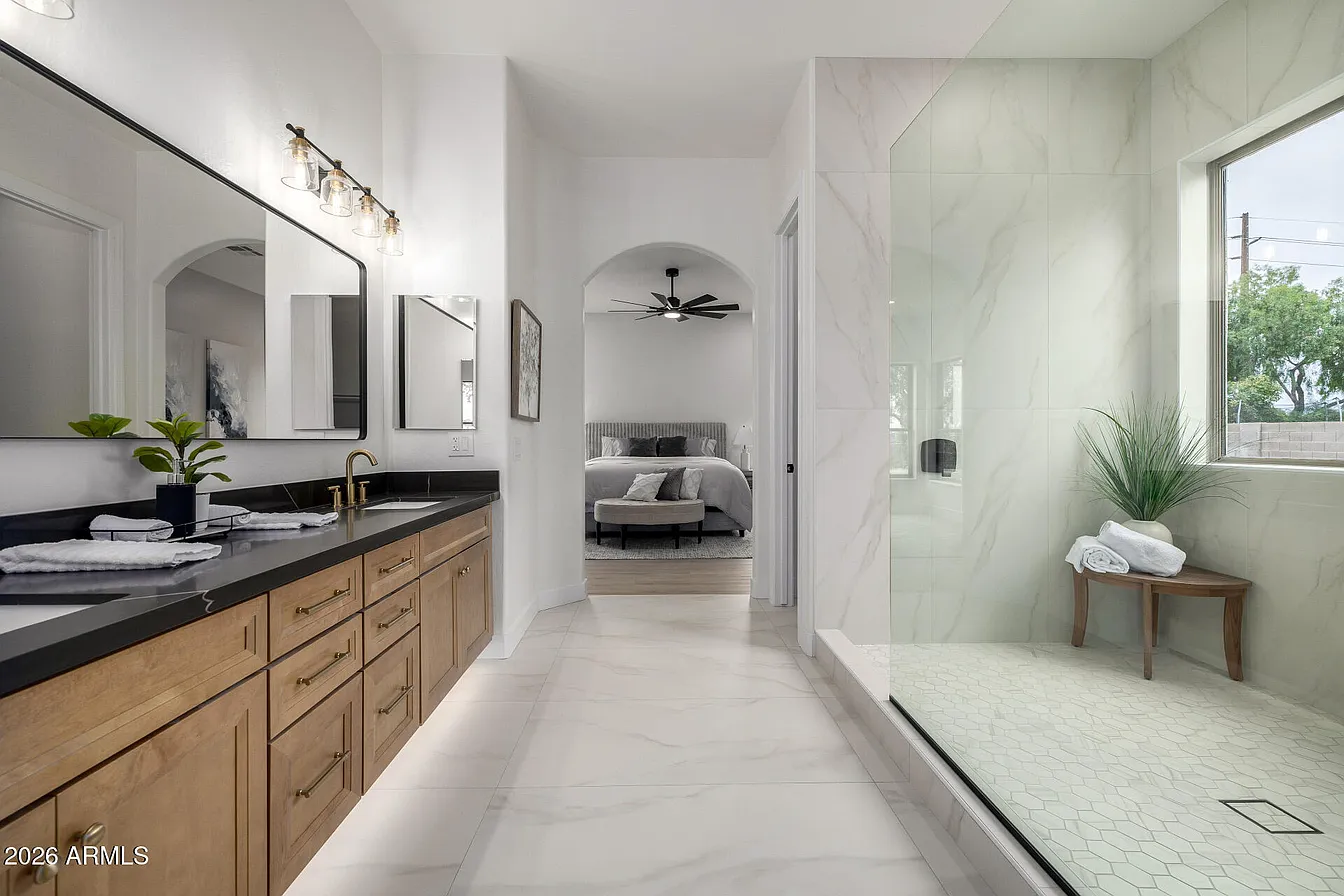 Master bathroom with wood vanity